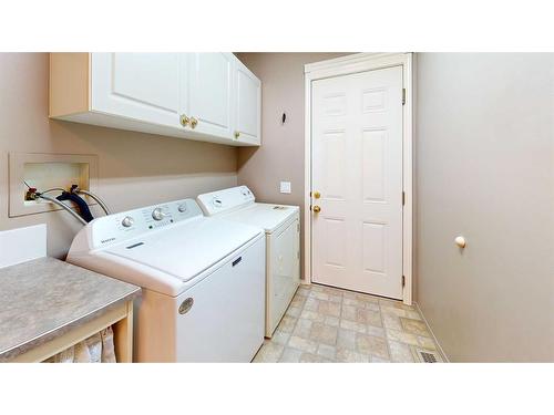 110 Riverside Place Nw, High River, AB - Indoor Photo Showing Laundry Room