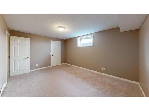 110 Riverside Place Nw, High River, AB - Indoor Photo Showing Other Room