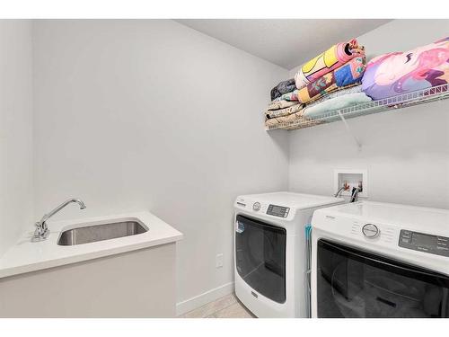 59 Sage Hill Heights Nw, Calgary, AB - Indoor Photo Showing Laundry Room