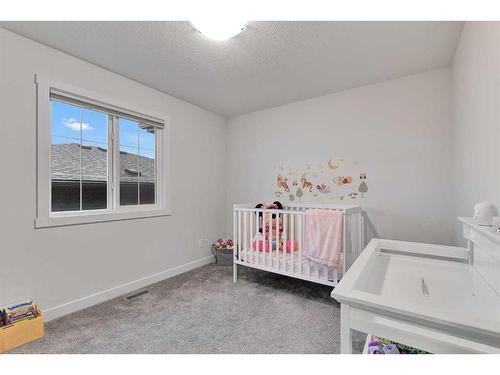 59 Sage Hill Heights Nw, Calgary, AB - Indoor Photo Showing Bedroom