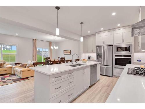 59 Sage Hill Heights Nw, Calgary, AB - Indoor Photo Showing Kitchen With Double Sink With Upgraded Kitchen