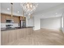 598 Seton Circle Se, Calgary, AB  - Indoor Photo Showing Kitchen 