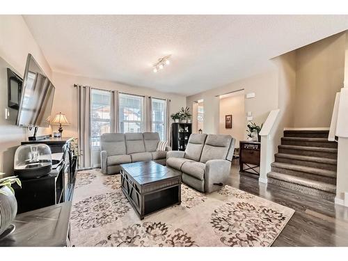 103 Walden Gardens Se, Calgary, AB - Indoor Photo Showing Living Room