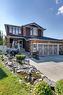 205 Magenta Crescent, Chestermere, AB  - Outdoor With Deck Patio Veranda With Facade 