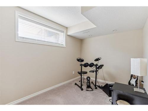 60 Wentworth Close Sw, Calgary, AB - Indoor Photo Showing Gym Room