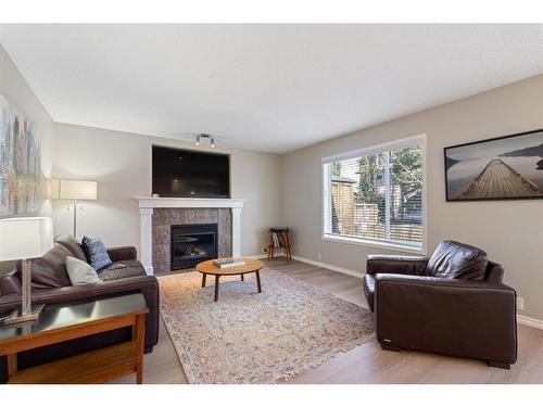 60 Wentworth Close Sw, Calgary, AB - Indoor Photo Showing Living Room With Fireplace