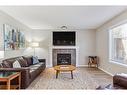 60 Wentworth Close Sw, Calgary, AB  - Indoor Photo Showing Living Room With Fireplace 