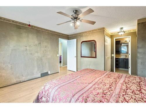 583 Woodpark Crescent Sw, Calgary, AB - Indoor Photo Showing Bedroom