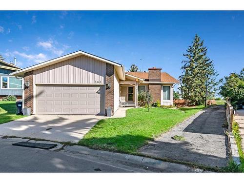 583 Woodpark Crescent Sw, Calgary, AB - Outdoor With Facade