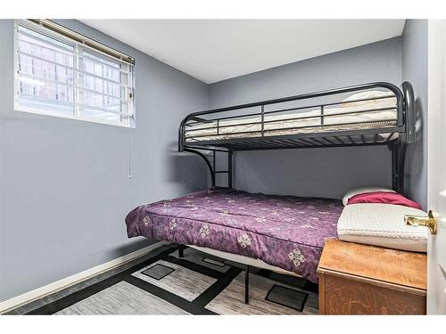 583 Woodpark Crescent Sw, Calgary, AB - Indoor Photo Showing Bedroom