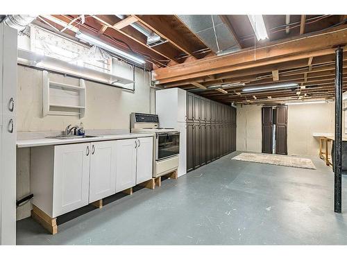 583 Woodpark Crescent Sw, Calgary, AB - Indoor Photo Showing Basement