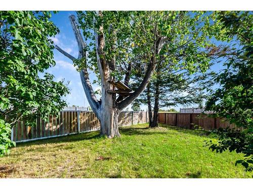 583 Woodpark Crescent Sw, Calgary, AB - Outdoor