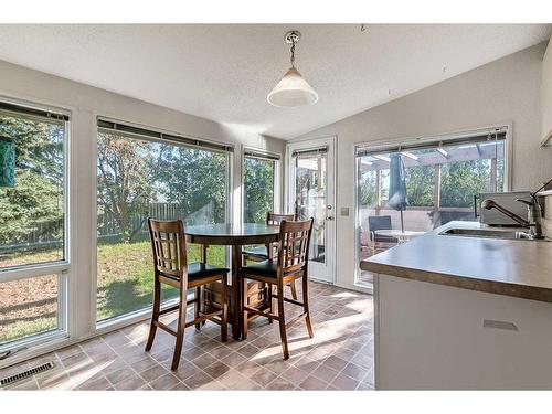 583 Woodpark Crescent Sw, Calgary, AB - Indoor Photo Showing Dining Room