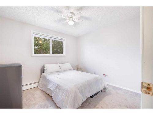 8-104 Sabrina Way Sw, Calgary, AB - Indoor Photo Showing Bedroom