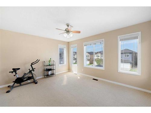 261 Martin Crossing Place Ne, Calgary, AB - Indoor Photo Showing Gym Room