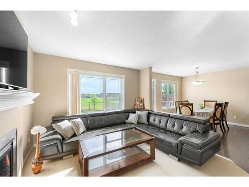 261 Martin Crossing Place Ne, Calgary, AB - Indoor Photo Showing Living Room