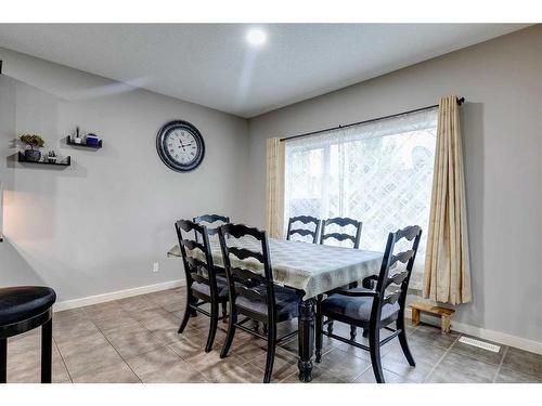 136 Cougartown Close Sw, Calgary, AB - Indoor Photo Showing Dining Room