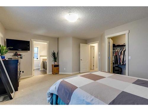 136 Cougartown Close Sw, Calgary, AB - Indoor Photo Showing Bedroom