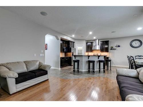 136 Cougartown Close Sw, Calgary, AB - Indoor Photo Showing Living Room