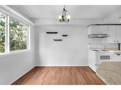 13-4531 7 Avenue Se, Calgary, AB - Indoor Photo Showing Kitchen