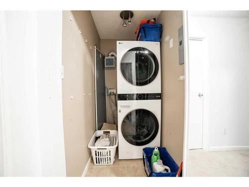 312-1919 36 Street Sw, Calgary, AB - Indoor Photo Showing Laundry Room