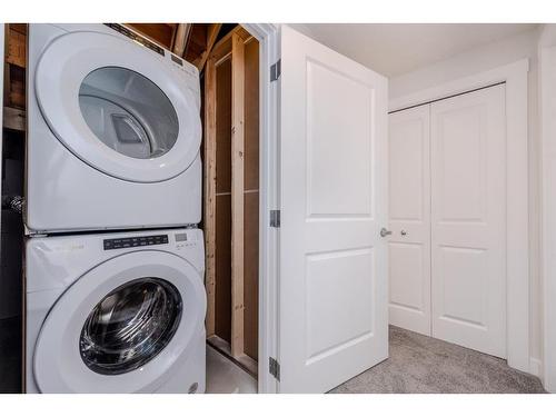 70 Cobbleridge Place Sw, Airdrie, AB - Indoor Photo Showing Laundry Room