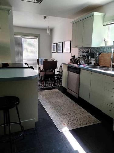 629 13 Avenue Ne, Calgary, AB - Indoor Photo Showing Kitchen With Double Sink