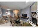 121-10120 Brookpark Boulevard Sw, Calgary, AB  - Indoor Photo Showing Living Room With Fireplace 