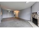 121-10120 Brookpark Boulevard Sw, Calgary, AB  - Indoor With Fireplace 