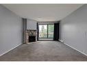 121-10120 Brookpark Boulevard Sw, Calgary, AB  - Indoor With Fireplace 