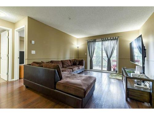 1212-16969 24 Street Sw, Calgary, AB - Indoor Photo Showing Living Room