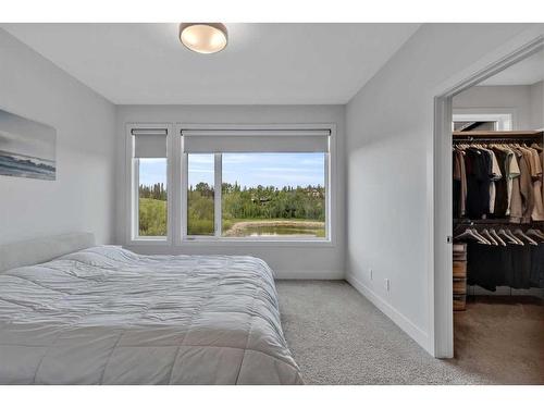 20 Royal Elm Green Nw, Calgary, AB - Indoor Photo Showing Bedroom