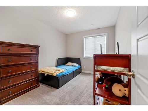 176 Howse Avenue Ne, Calgary, AB - Indoor Photo Showing Bedroom