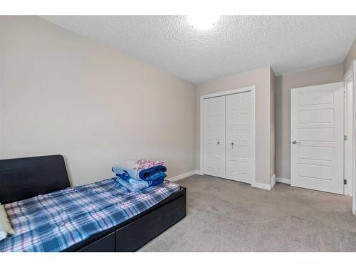 176 Howse Avenue Ne, Calgary, AB - Indoor Photo Showing Bedroom