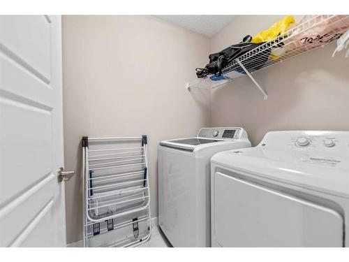 176 Howse Avenue Ne, Calgary, AB - Indoor Photo Showing Laundry Room