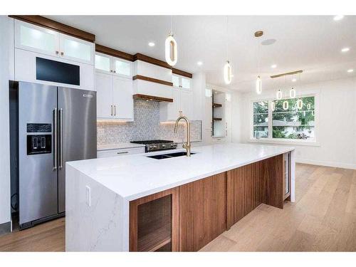 105 Hartford Road Nw, Calgary, AB - Indoor Photo Showing Kitchen With Double Sink With Upgraded Kitchen