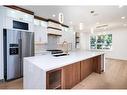 105 Hartford Road Nw, Calgary, AB  - Indoor Photo Showing Kitchen With Double Sink With Upgraded Kitchen 