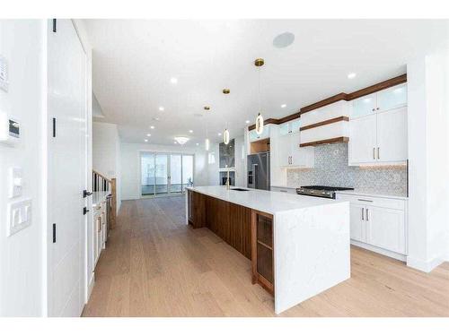 105 Hartford Road Nw, Calgary, AB - Indoor Photo Showing Kitchen With Upgraded Kitchen