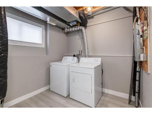 64 Prestwick Acres Lane Se, Calgary, AB - Indoor Photo Showing Laundry Room