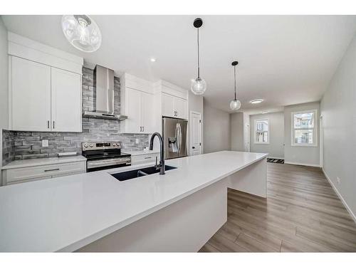 208 Lucas Place Nw, Calgary, AB - Indoor Photo Showing Kitchen With Double Sink With Upgraded Kitchen