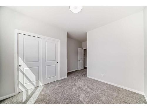 208 Lucas Place Nw, Calgary, AB - Indoor Photo Showing Other Room