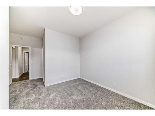 208 Lucas Place Nw, Calgary, AB - Indoor Photo Showing Other Room