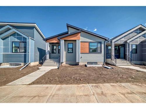 208 Lucas Place Nw, Calgary, AB - Outdoor With Facade