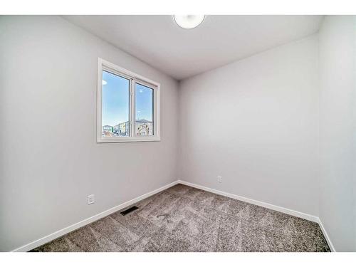 208 Lucas Place Nw, Calgary, AB - Indoor Photo Showing Other Room