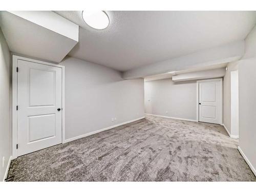 208 Lucas Place Nw, Calgary, AB - Indoor Photo Showing Other Room