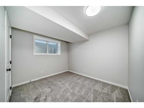 208 Lucas Place Nw, Calgary, AB - Indoor Photo Showing Other Room