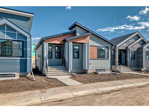 208 Lucas Place Nw, Calgary, AB - Outdoor With Facade