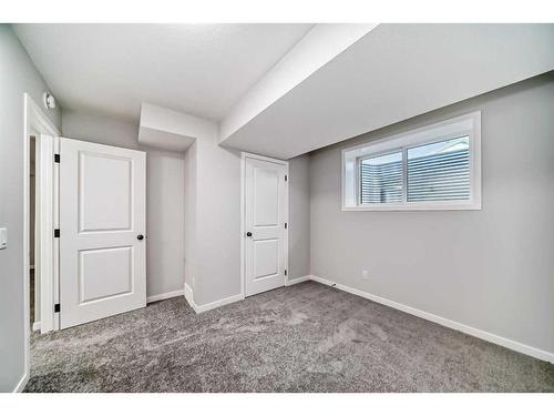 208 Lucas Place Nw, Calgary, AB - Indoor Photo Showing Other Room