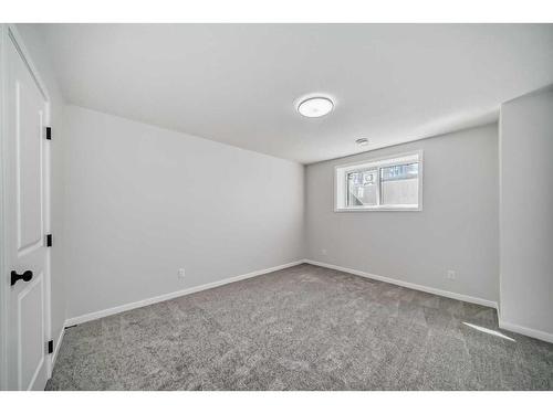 208 Lucas Place Nw, Calgary, AB - Indoor Photo Showing Other Room