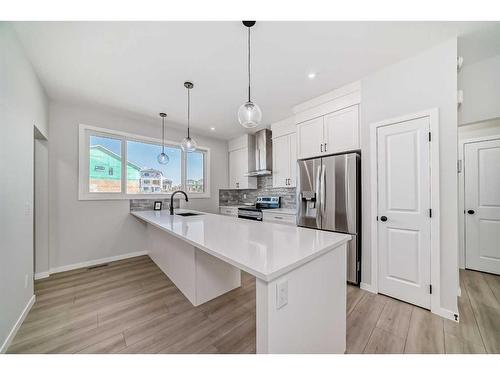 208 Lucas Place Nw, Calgary, AB - Indoor Photo Showing Kitchen With Stainless Steel Kitchen With Upgraded Kitchen